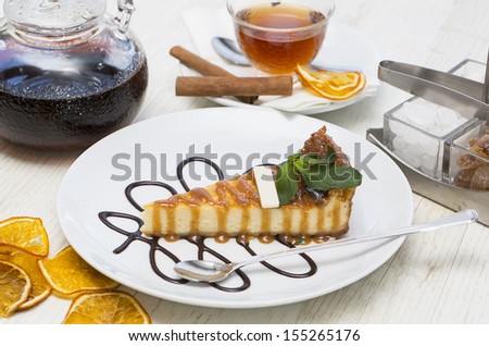 piece of cheese cake on a table in a restaurant