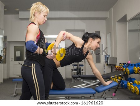 young girl in the gym for sports coach