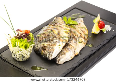 sea fish cooked on the grill