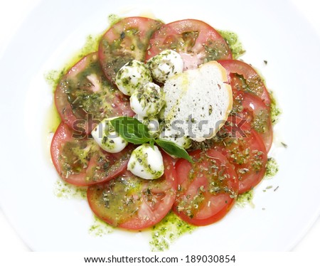 appetizer with tomatoes and cheese in a restaurant