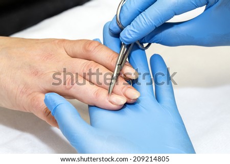 woman doing manicure beauty salon