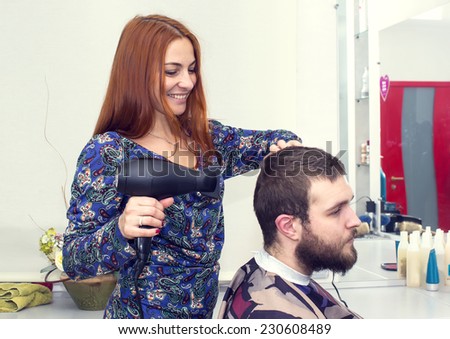man in a beauty salon doing hair