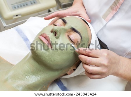 Woman in a beauty salon doing massage
