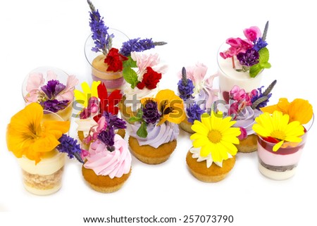 canaps with edible flowers meat cheese and seafood