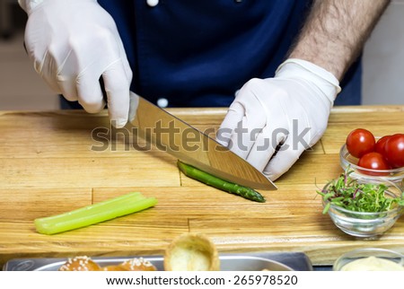 cook prepares canapes in the kitchen at the restaurant