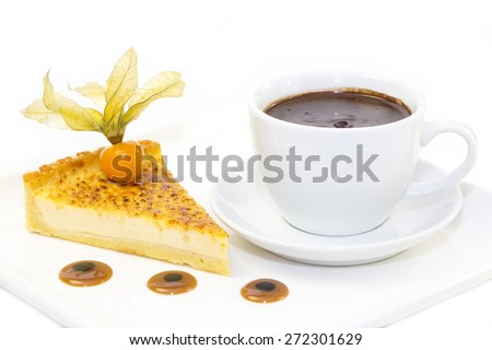 piece of cake with passion fruit and a cup of hot chocolate