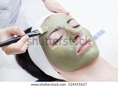 Process of massage and facials in beauty salon