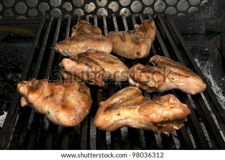 Baked chicken wings on grill instant food