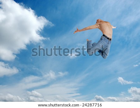 high jumping man on sky background