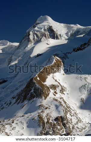 Lyskamm peak of the monte rosa mountain range. View from the west side.