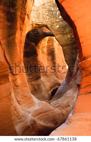 Arch inside Peek-A-Boo slot canyon, Hole in a Rock road, Grand Staircase National Monument, Utah, USA