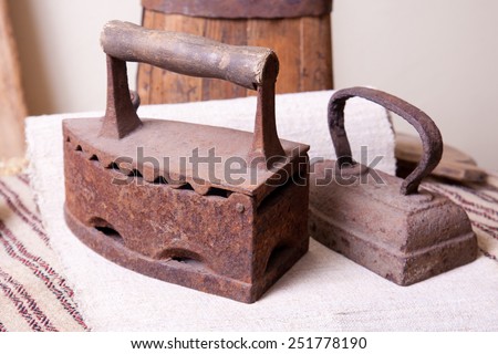 Two rusty old iron for ironing clothes