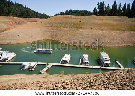 Lake Shasta, CA, August 20, 2014 -- California\'s lingering drought exposes the 180-200 foot drop in water levels. The state\'s largest reservoir is receding at an average of 4.9 inches per day.