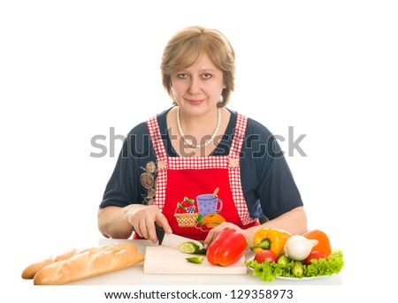 elderly woman cooks food