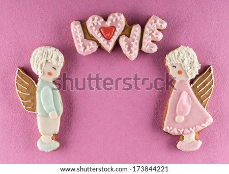 Cookies with the text of love and couple of angels on Valentine\'s day