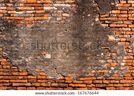 Cement plaster on red brick Structure of the walls to hold it down.