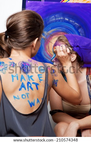 Make Art Not War body painting