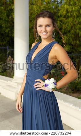Beautiful Teenage Girl in her Prom Dress Outdoors