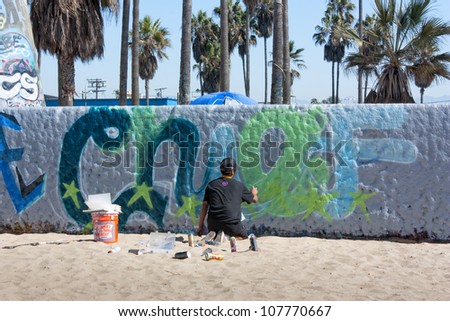 VENICE,CA-CIRCA SEPT 2010:An unidentified artist practices his art on the Venice Public Art Graffiti Walls circa Sept. 2010.The Venice Public Art Walls are managed by a local public arts organization