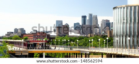 MINNEAPOLIS/USA - JULY 23: Downtown Minneapolis skyline from the campus of University of Minnesota on the campus of the University of Minnesota, the 6th largest university in the USA. July 23, 2012.