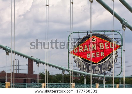 MINNEAPOLIS, MN/USA - AUGUST 6, 2011:  Grain Belt Beer sign over Nicollet Island in downtown Minneapolis. Grain Belt beer is brewed in the state of Minnesota by the August Schell Brewing Company.