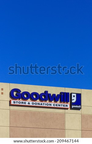 VALENICA, CA/USA - AUGUST 5, 2014: Goodwill store exterior sign. Goodwill Industries is a nonprofit organization that provides job training programs for people with disabilities.