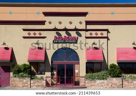 VALENCIA, CA/USA - AUGUST 17, 2014. Red Robbin Gourmet Burger restaurant exterior. Red Robin is a chain of casual dining restaurants founded in 1969 in Seattle, Washington.