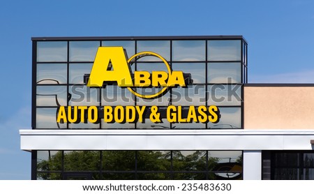 MINNEAPOLIS, MN/USA - JUNE 29, 2014: Abra Auto Body and Glass exterior. Abra Auto Body and Glass is an auto body repair chain.