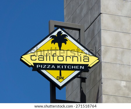 HOLLYWOOD, CA/USA - APRIL 18, 2015: California Pizza Kitchen sign and logo. California Pizza Kitchen is a casual dining restaurant chain that specializes in New York-style pizza.