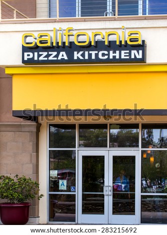VALENCIA, CA/USA - MAY 17, 2015: California Pizza Kitchen exterior. California Pizza Kitchen is a casual dining restaurant chain that specializes in California-style pizza.