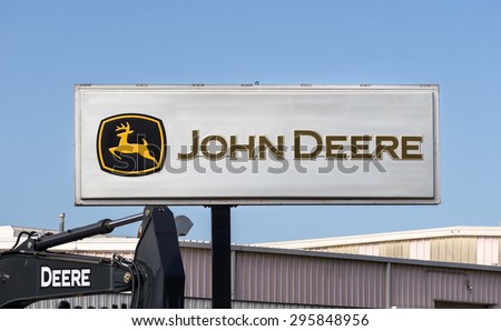 LOS ANGELES, CA/USA - JULY 11, 2015: John Deere equipment dealership sign and logo. Deere & Company is an American corporation that manufactures agricultural, construction and lawn care equipment.