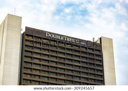 BLOOMINGTON, MN/USA - August 13, 2015: Double Tree by Hilton hotel exterior. Hilton is an international chain of full service hotels and resorts and the flagship brand of Hilton Worldwide.