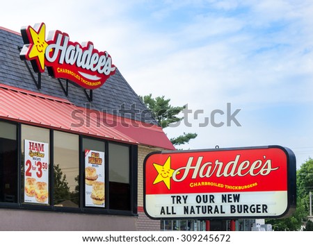 GRINNELL, IA/USA - AUGUST 8, 2015: Hardee\'s restaurant exterior and sign. Hardee\'s Food Systems, Inc., is an American fast-food restaurant chain.