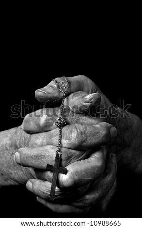 a close up view of praying hands