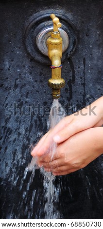 close-ups of hand washing with tap water under