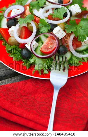 Salad with feta cheese and greek olives. green salad.
