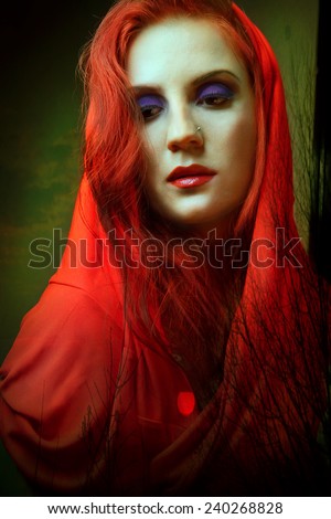 gothic woman in red hood. gothic