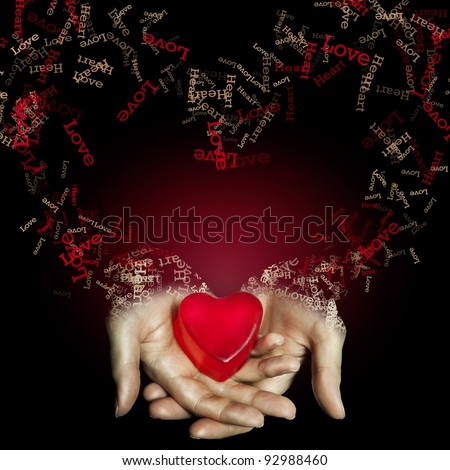Red heart in hand on black background. love and heart. love concept.