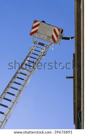 Fireman making a inspection y a top of the building