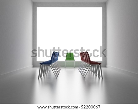 Two groups of colors chairs facing and one chair like a referee