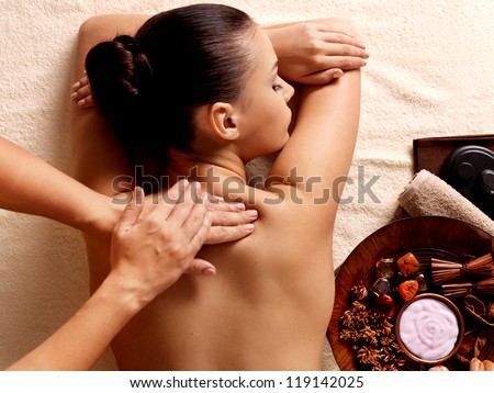 Masseur doing massage on woman body in the spa salon Beauty treatment concept Masseur doing massage on woman body in the spa salon Beauty treatment concept