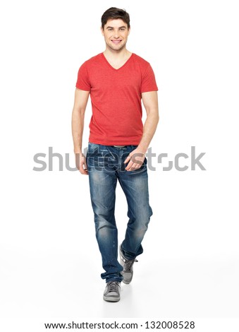 Full portrait of smiling  walking man in red t-shirt casuals  isolated on white background.