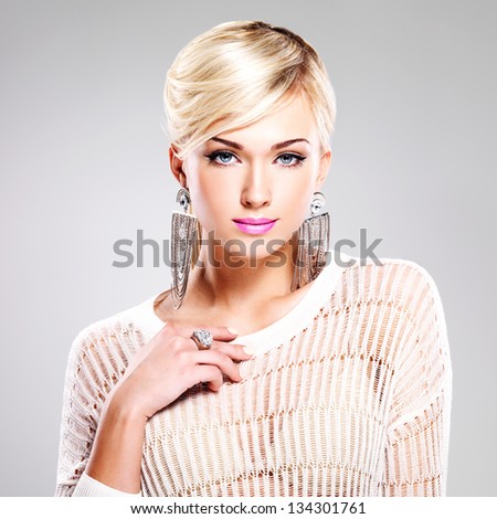 Portrait Of Beautiful Woman With Bright Fashion Makeup And White Hairs.