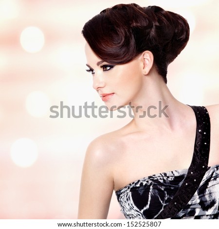 Face Of Beautiful Woman With Fashion Hairstyle And Glamour Makeup - Over Creative Soft Bokeh Background