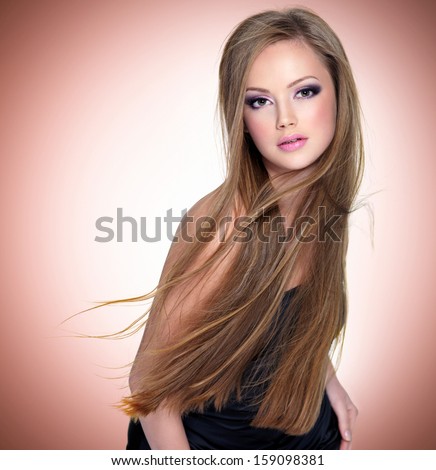Pretty Young Woman With Beautiful Long Straight Hair And Attractive Face