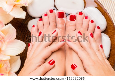 Closeup photo of a beautiful female feet at spa salon on pedicure procedure