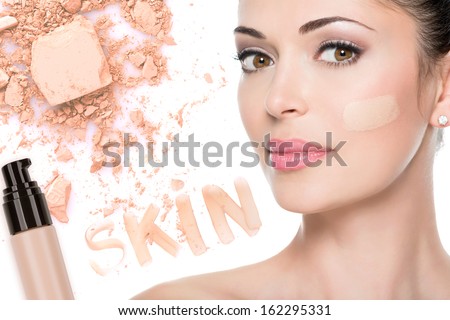 Model Face Of Beautiful Woman With Foundation On Skin Make-Up Cosmetics .