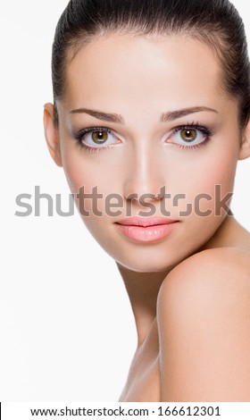 Closeup Portrait Of Beautiful Woman With Fresh Skin Of Face - Isolated On White