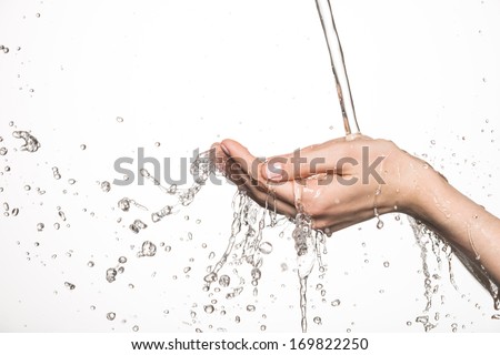 Closeup Female Hands Under The Stream Of Splashing Water - Skin Care Concept