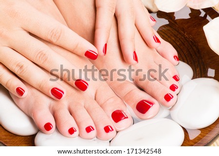 Closeup photo of a beautiful female feet at spa salon on pedicure procedure